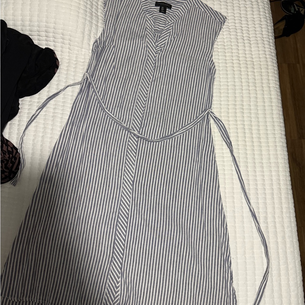 Colorful Patterned Clothing Stack - image 7